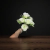A white artificial rose bouquet simulating preserved flowers for wedding decoration and living room ornaments Application Scenario